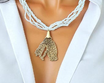 Elegant White Beaded Tassel Necklace with Gold Chain Detailing