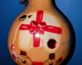 SHEEP ON WHEELS is a hand painted gourd