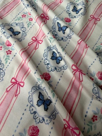 Coquette Butterfly Ribbon Bamboo Spandex Fabric on other fabric