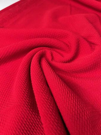 Solid Red Bullet Fabric on bullet liverpool knit fabric