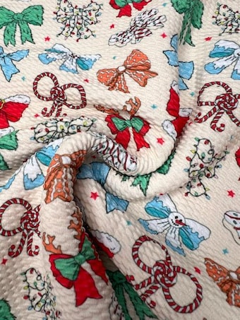 Christmas Bows Bullet Fabric on bullet liverpool knit fabric