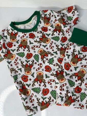 Christmas Reindeer Girl with Bow Pajamas — handmade children's apparel, Christmas pajamas and holiday dresses