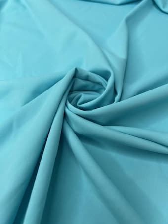 Aqua Swim Nylon Heavy Spandex Fabric - Solid Aqua Stretch Knit for Swimwear & Activewear on swim fabric