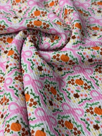 Autumn Pink Bows & Pumpkin Bullet Knit Fabric on bullet liverpool knit fabric