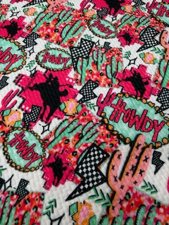 Punchy Western Howdy Bullet Fabric on bullet liverpool knit fabric
