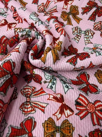 Christmas Bows Bullet Fabric on bullet liverpool knit fabric