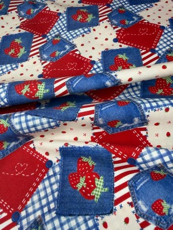 Americana Strawberry Cotton Fabric on 100% woven cotton fabric