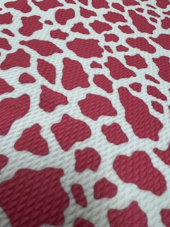 Pink and White Cow Bullet Fabric on bullet liverpool knit fabric