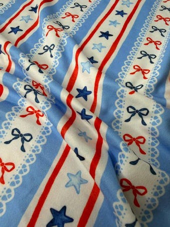 Americana Bows and Stars DBP Fabric on double brushed poly fabric