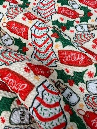 Christmas Jolly Cakes Printed on Bullet Knit Fabric on bullet liverpool knit fabric