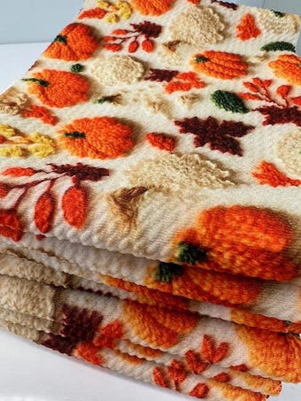 Autumn Leaves & Pumpkins Bullet Fabric - Soft Textured Knit for Seasonal Sewing. Pre-Cut Bow Strips on bullet liverpool knit fabric