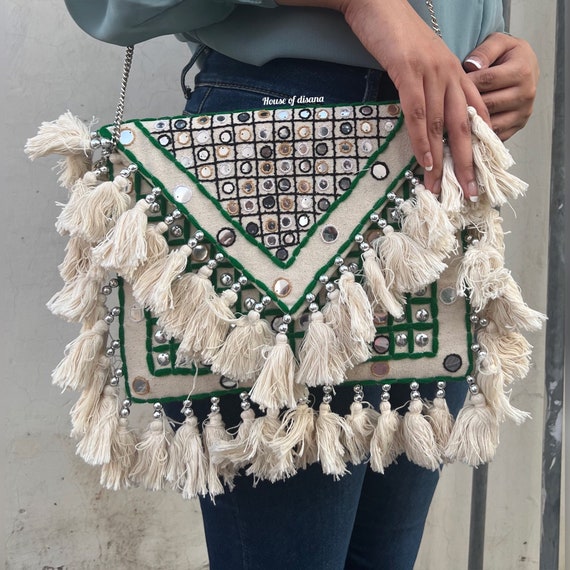 Use our exclusive embroidery border and other emblishments for designing  bohemian bags