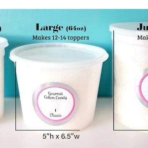 May include: Three white plastic containers of different sizes filled with cotton candy. The containers are labeled "Regular (32oz)", "Large (64oz)", and "Jumbo (85oz)" and each container has a silver label that says "Gourmet Cotton Candy Classic".