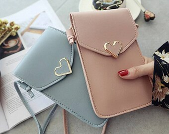 Purse that holds phone sales