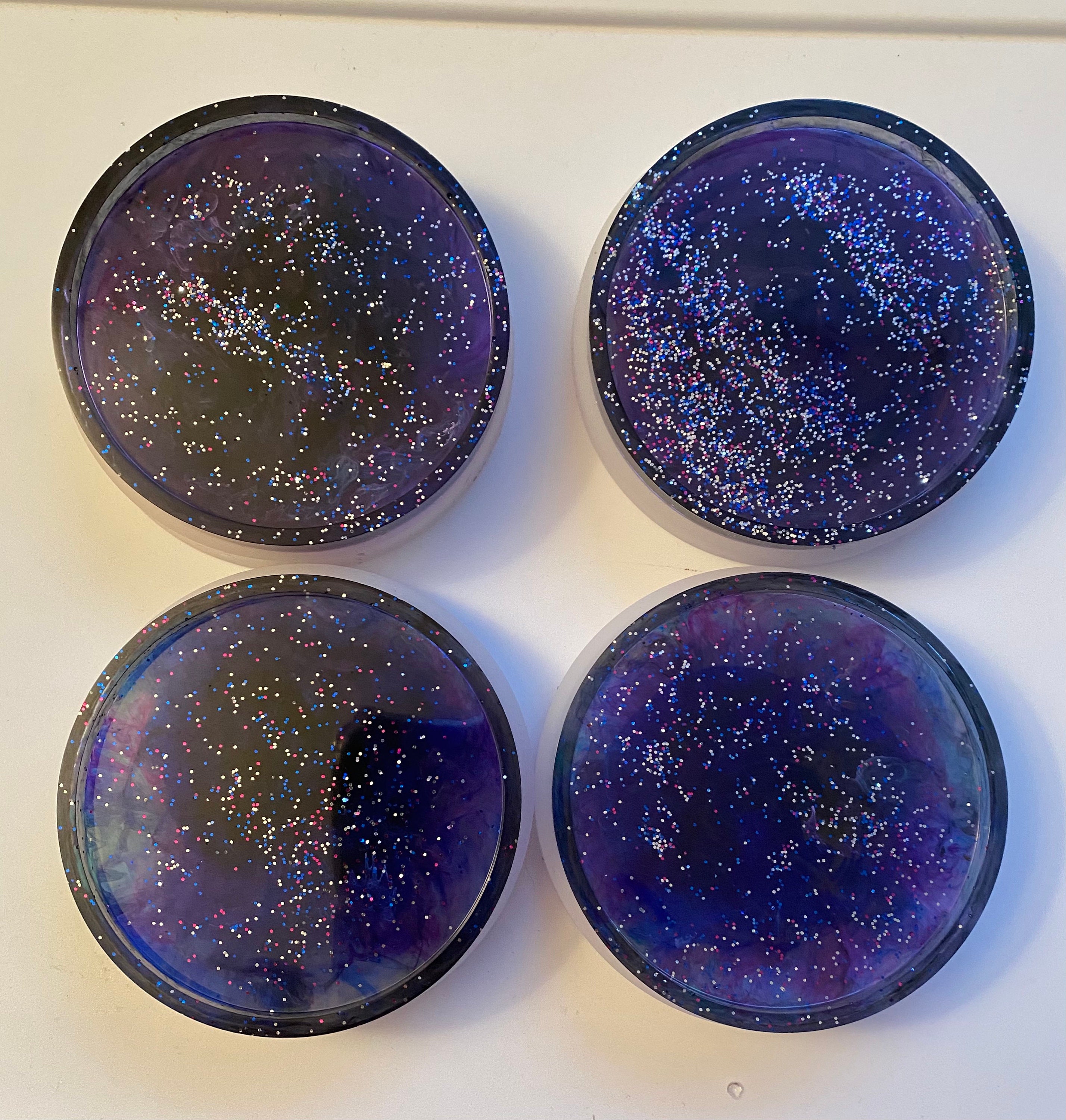 Round Galaxy coasters made with resin alcohol inks and Etsy