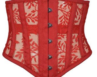 May include: A red corset with a lace overlay and a busk closure. The corset has a pointed bottom and is made of a soft, stretchy fabric.
