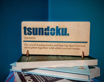 Wooden tsundoku sign
