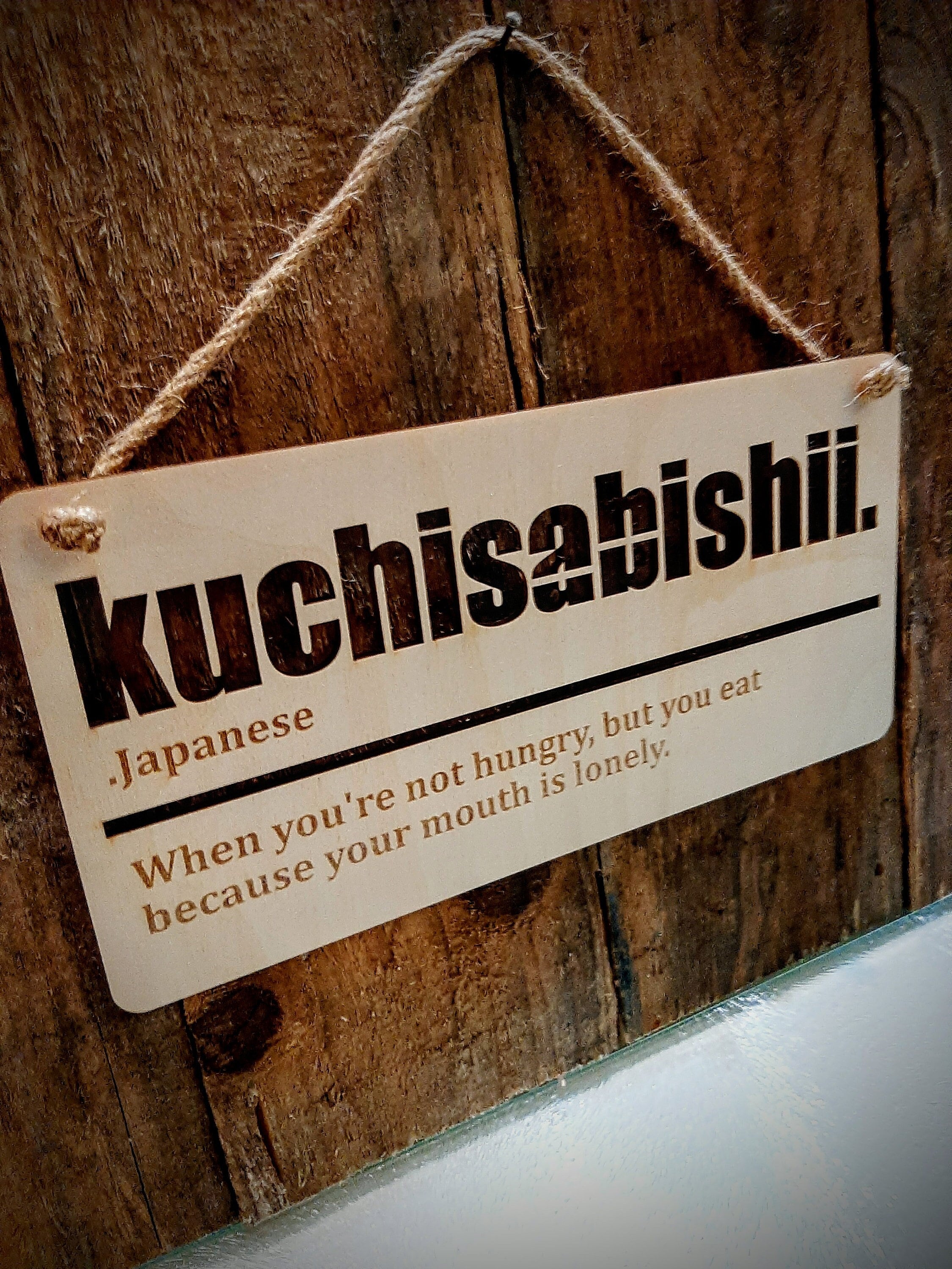 Wooden kuchisabishii sign