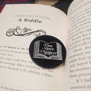 One more chapter or go to bed reading coin for book lovers