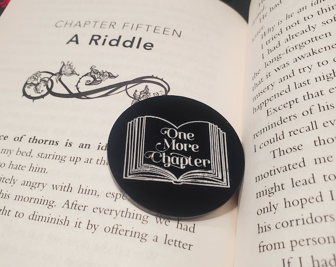 One more chapter or go to bed reading coin for book lovers