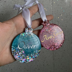 Personalised resin Christmas baubles