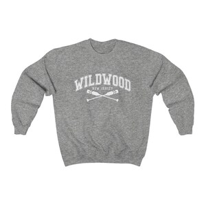 May include: A heather gray sweatshirt with a white graphic print that says "WILDWOOD NEW JERSEY" with two crossed oars.
