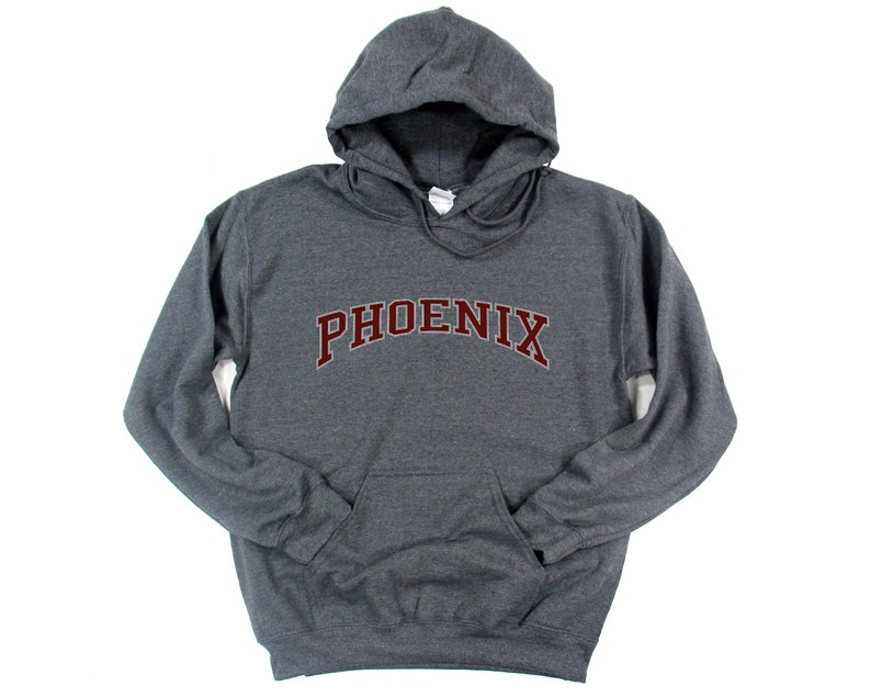 May include: A dark gray hooded sweatshirt with the word "PHOENIX" in maroon lettering across the front.
