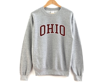 May include: Grey sweatshirt with a maroon "OHIO" graphic on the front.