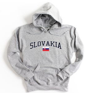 May include: Gray hooded sweatshirt with the word "SLOVAKIA" in navy blue letters with the Slovakian flag underneath.