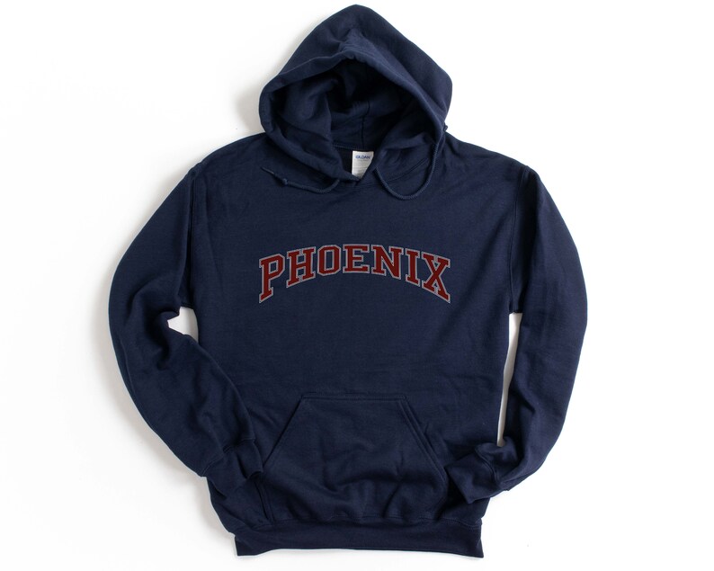 May include: Navy blue hooded sweatshirt with the word "PHOENIX" in maroon letters.