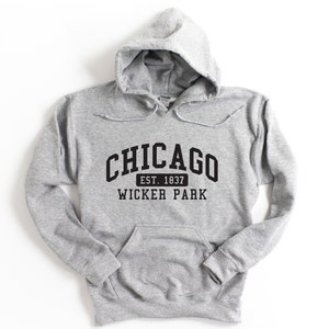 May include: Gray hooded sweatshirt with black text that reads "CHICAGO EST. 1837 WICKER PARK"