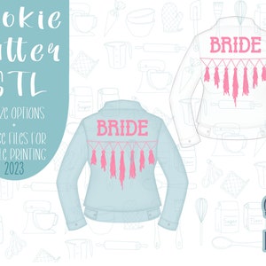 May include: A digital download of a cookie cutter design for a denim jacket with the word "BRIDE" and pink tassels. The design is shown on a blue denim jacket with a white background. The text "Cookie Cutter STL" and "8 Size Options + Image Files for Edible Printing 2023" is also included in the image.