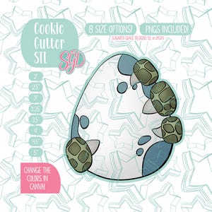 May include: A turtle-shaped cookie cutter design with a white and blue outline. The design includes the text "Cookie Cutter STL" and "8 SIZE OPTIONS!" with sizes ranging from 5 cm to 12.7 cm. The image also includes the text "CHANGE THE COLORS IN CANVA!"