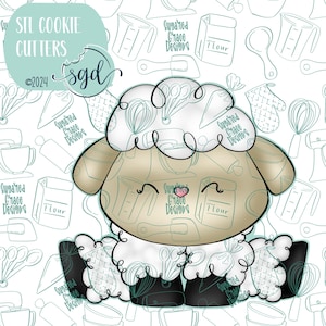 May include: A white sheep cookie cutter with black legs and a brown face. The sheep is sitting down with its eyes closed and a small pink heart on its nose. The background is a white pattern of kitchen tools and the text "Sugared Grace Designs" in teal.