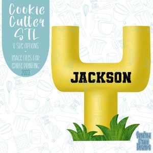 May include: A yellow football-shaped cookie cutter with the name "JACKSON" in black block letters. The cutter has a grass design at the bottom. Text on the left says "Cookie Cutter STL" and "8 SIZE OPTIONS + IMAGE FILES FOR CDRIC PRINTING 2023".