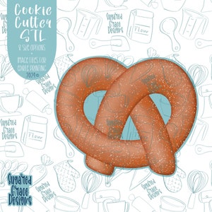 Puede incluir: Un cortador de galletas de pretzel marrón con textura moteada. El cortador tiene forma de pretzel con un nudo en el centro. La imagen está rodeada de un patrón de utensilios de cocina y el texto "Suggared Grace Designs".
