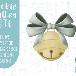 May include: A gold-colored cookie cutter shaped like a bell with a light blue bow. The cutter is on a white background with a pattern of baking-related items.