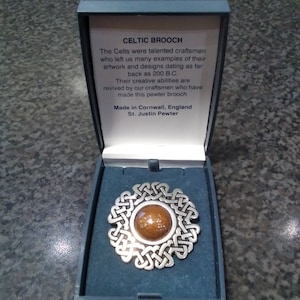 Vintage St. Justin Celtic Pewter and copper brooch. Design by Gito.