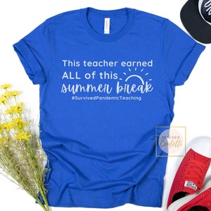 May include: A royal blue t-shirt with white text that reads "This teacher earned ALL of this. summer break #SurvivedPandemicTeaching".