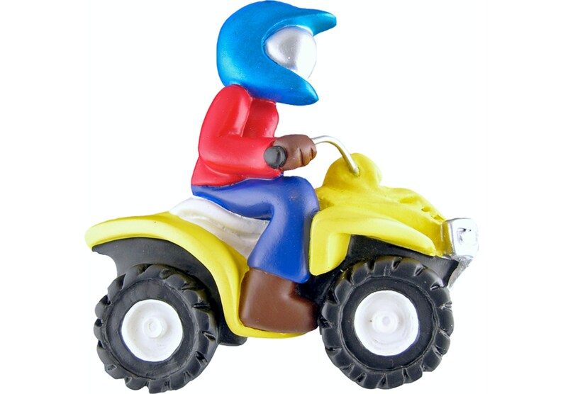 May include: A yellow toy ATV with a blue and red figurine wearing a blue helmet. The figurine is sitting on the ATV and holding the handlebars.