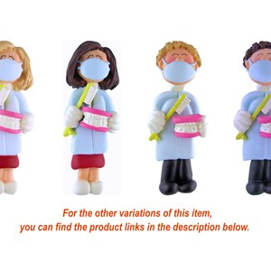 May include: Four figurines of dentists wearing blue coats and face masks, holding toothbrushes and a set of teeth. The figurines are in different colors and have different hair styles.