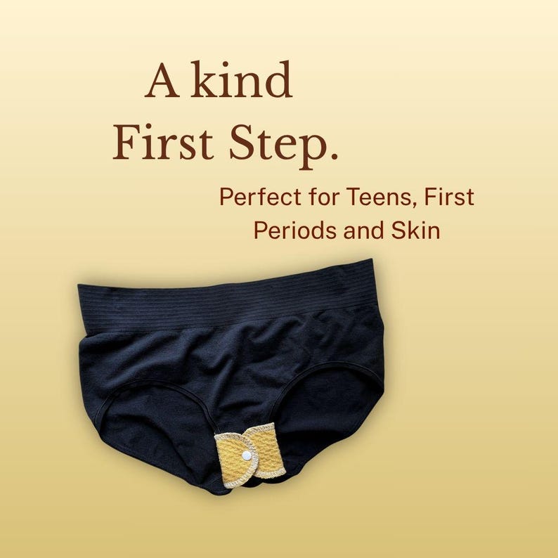 Golden Sand reusable cloth pad secured around black underwear with snap wings, shown beneath text describing the pad as an option for teens and first periods.