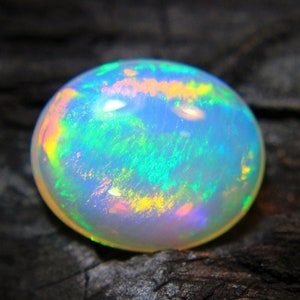4.Ct Top Quality Natural Ethiopian Opal Oval Shape, A Gemstone for the Fiery, Sparkling and Unique Opal with Fire and Rainbows image 4