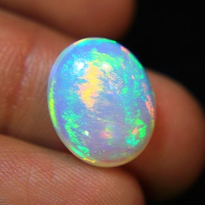 4.Ct Top Quality Natural Ethiopian Opal Oval Shape, A Gemstone for the Fiery, Sparkling and Unique Opal with Fire and Rainbows image 1