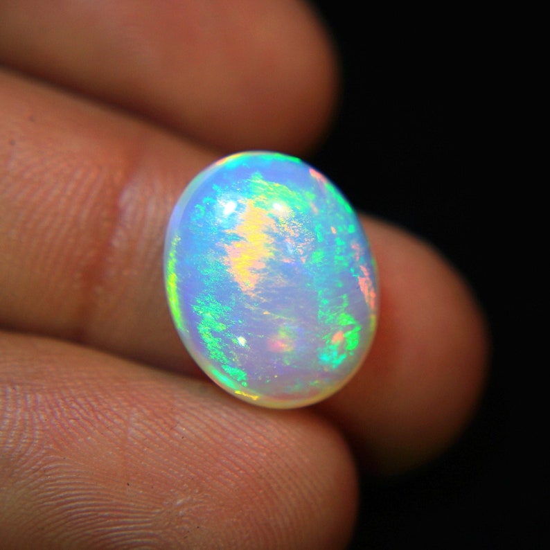 4.Ct Top Quality Natural Ethiopian Opal Oval Shape, A Gemstone for the Fiery, Sparkling and Unique Opal with Fire and Rainbows image 1