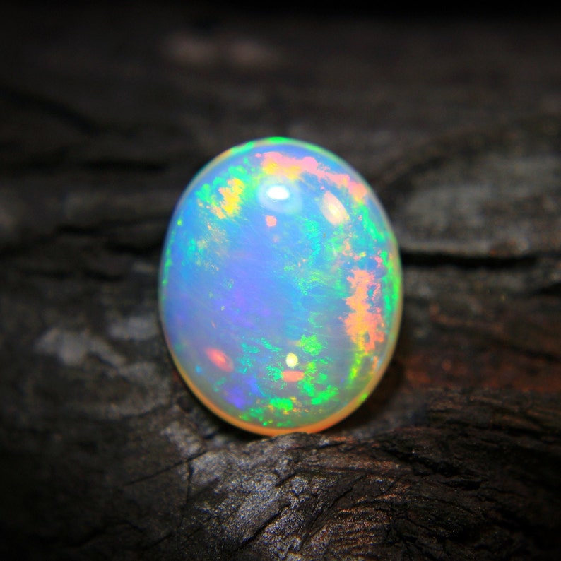 4.Ct Top Quality Natural Ethiopian Opal Oval Shape, A Gemstone for the Fiery, Sparkling and Unique Opal with Fire and Rainbows image 8