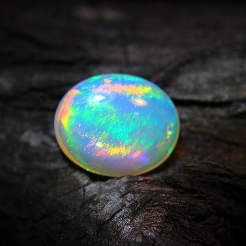 4.Ct Top Quality Natural Ethiopian Opal Oval Shape, A Gemstone for the Fiery, Sparkling and Unique Opal with Fire and Rainbows image 4