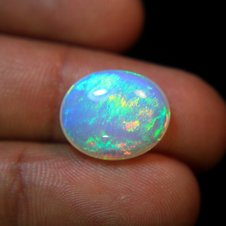 4.Ct Top Quality Natural Ethiopian Opal Oval Shape, A Gemstone for the Fiery, Sparkling and Unique Opal with Fire and Rainbows image 3