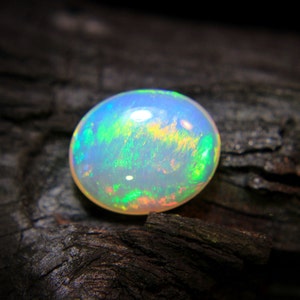 4.Ct Top Quality Natural Ethiopian Opal Oval Shape, A Gemstone for the Fiery, Sparkling and Unique Opal with Fire and Rainbows image 6