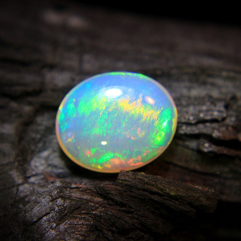 4.Ct Top Quality Natural Ethiopian Opal Oval Shape, A Gemstone for the Fiery, Sparkling and Unique Opal with Fire and Rainbows image 6